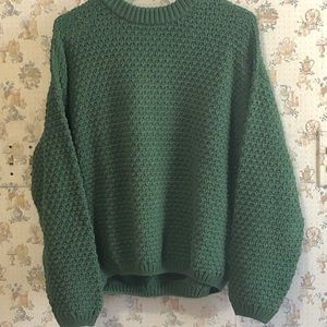 Green acrylic sweater.